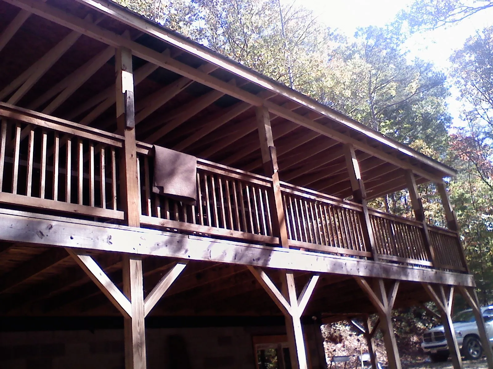 Timber framing under a new elevated porch and deck — Roof Leak Repair in Rossburg by Roofing Brothers